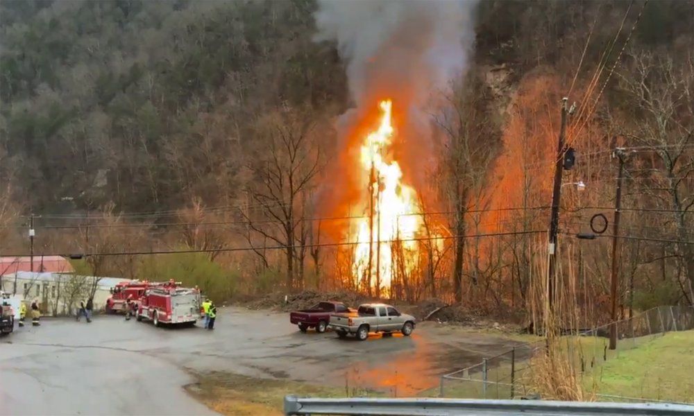 Fiery train derailment in Kentucky spills ethanol into river